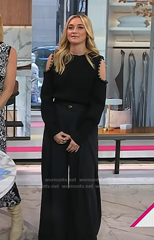 Jasmine Snow’s black cold-shoulder sweater and wide leg pants on Today