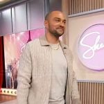Jesse Williams’s beige collared cardigan on Sherri