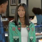 Jessica’s green embroidered jacket and floral jeans on Beyond the Gates
