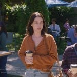 Jules’s orange cardigan and bandana patch jeans on Greys Anatomy