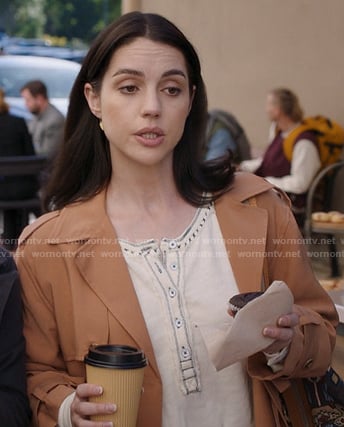 Jules’ white henley top and orange cropped trench jacket on Greys Anatomy