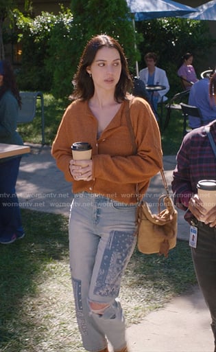 Jules's orange cardigan and bandana patch jeans on Greys Anatomy