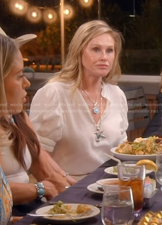 Kathy’s white lace inset top on The Real Housewives of Beverly Hills