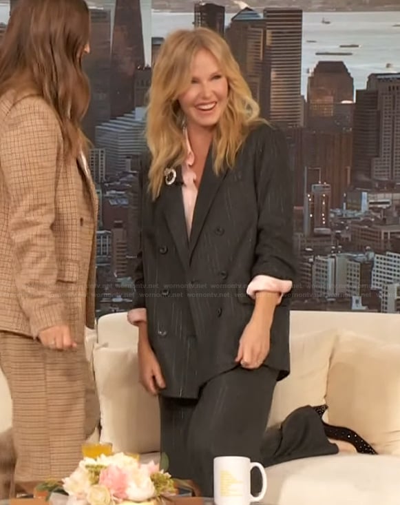 Kelli Giddish's black pinstripe blazer and pants on The Drew Barrymore Show
