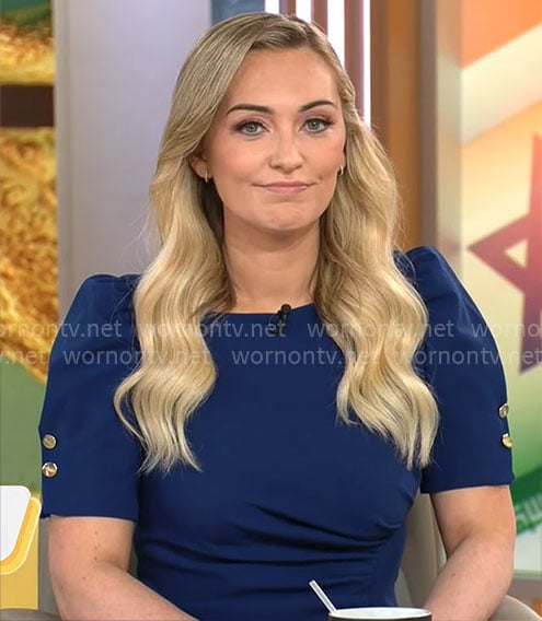 Kelly O'Grady's dark blue puff-sleeve dress on CBS Mornings