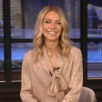 Kelly’s beige tie neck blouse on Live with Kelly and Mark