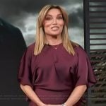 Kit’s burgundy satin mini dress on Access Hollywood