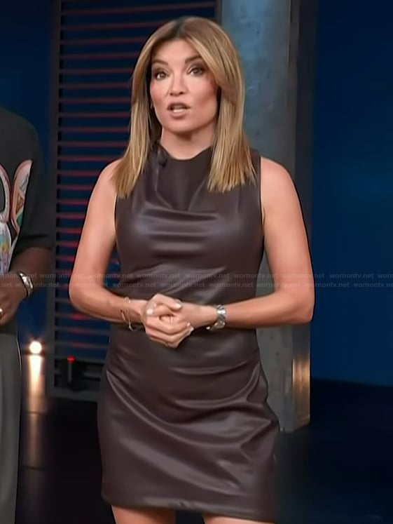Kit's brown sleeveless leather mini dress on Access Hollywood
