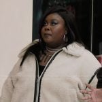 Krystal’s white fleece jacket on Abbott Elementary