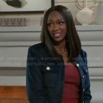 Laura’s navy jacket with gold buttons on Beyond the Gates