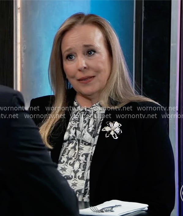 Laura's black and white printed tie-neck blouse on General Hospital