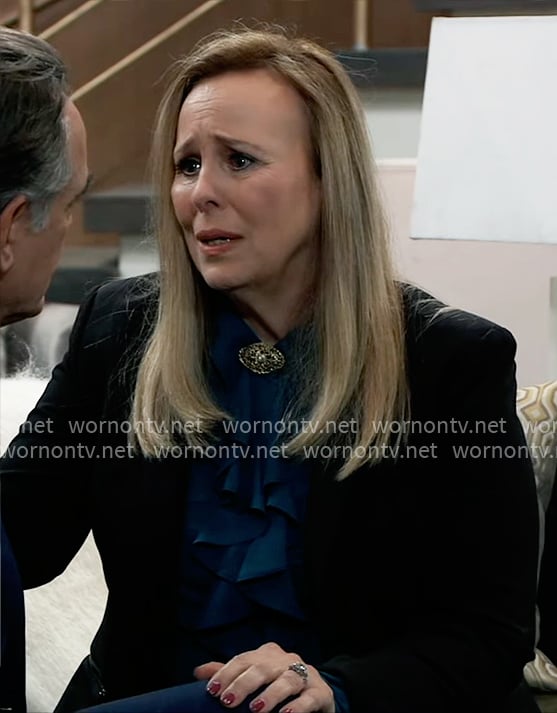 Laura’s teal blue ruffled blouse on General Hospital