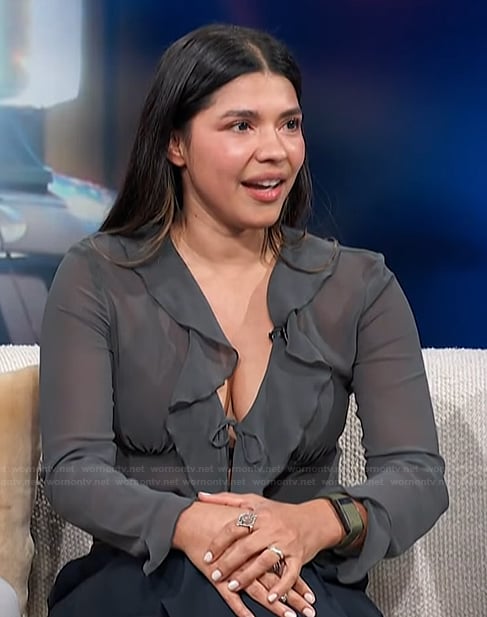 Lisseth Chavez's gray ruffle front top on Access Hollywood