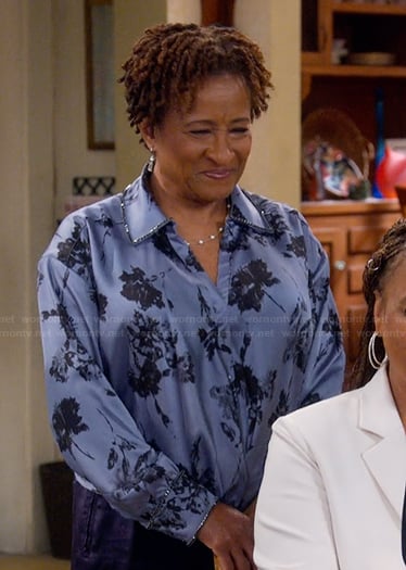 Lucretia’s blue floral print top on The Upshaws