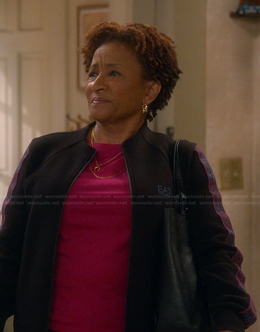 Lucretia's purple tracksuit on The Upshaws