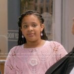 Maya’s pink open knit floral sweater on The Upshaws