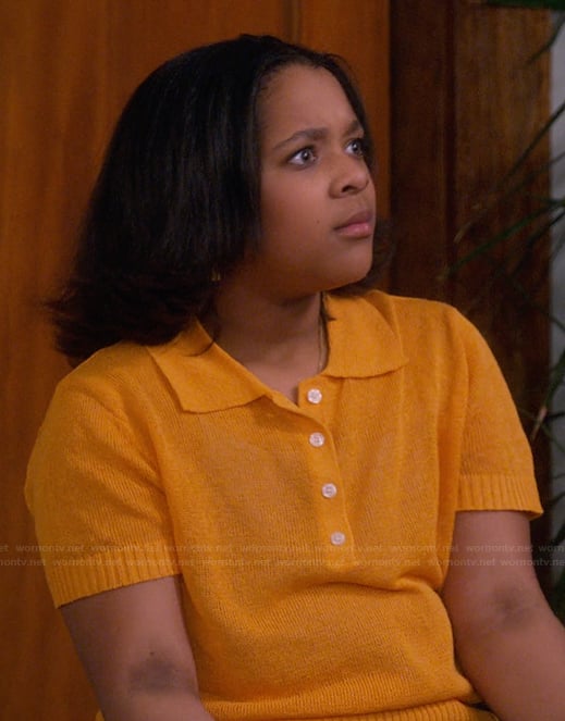 Maya's orange short sleeve sweater on The Upshaws
