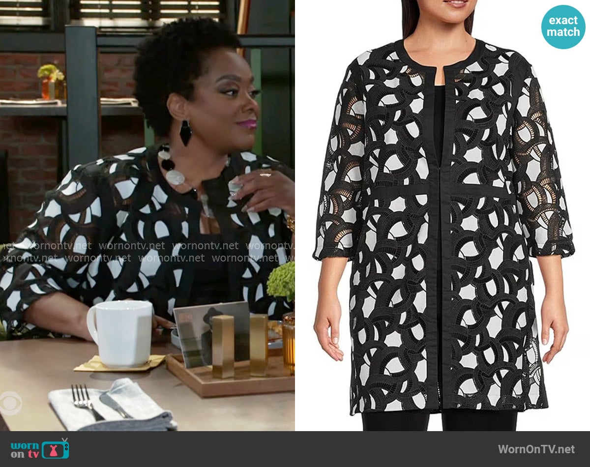 Mona’s black and white jacket on Beyond the Gates