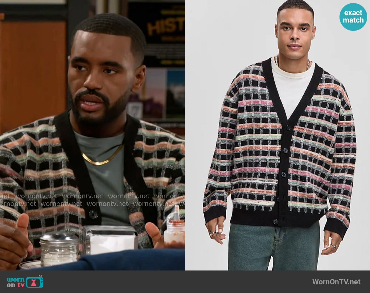 Andre’s checked cardigan on Beyond the Gates