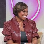 Monique Kelley’s burgundy leather jacket on Access Hollywood