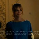 Morgan’s blue top with flower sleeves on High Potential