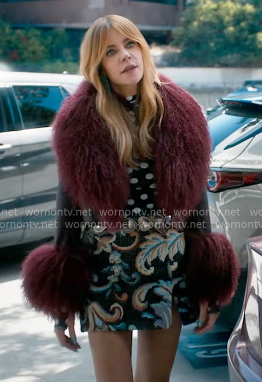 Morgan's polka dot mesh top, printed skirt and red fur collar jacket on High Potential