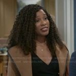 Naomi’s camel coat with leather trim on Beyond the Gates