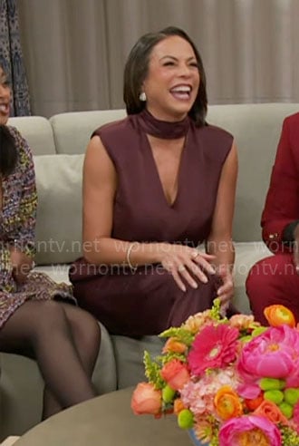 Nicole's plum jumpsuit with cutout chest on Beyond the Gates