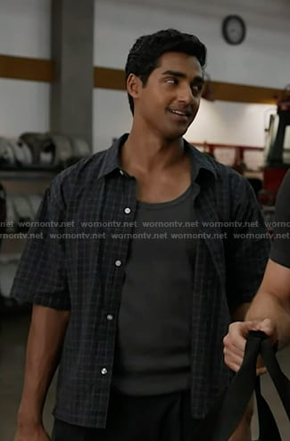 Ravi’s navy grid check short sleeve shirt on 9-1-1