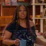 Regina’s black Fleetwood Mac graphic tee on The Upshaws