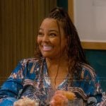 Regina’s blue printed top on The Upshaws