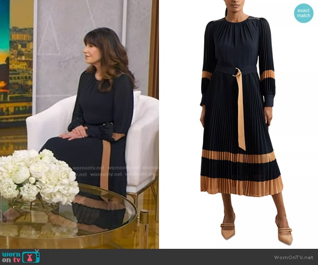 Paula McLain’s navy pleated dress on GMA Paula McLain’s navy pleated dress on GMA