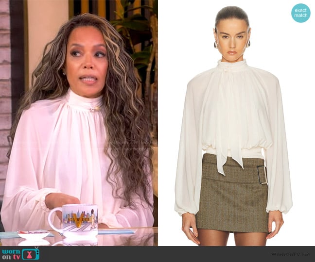 Sunny’s white tie neck blouse on The View