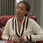 Samantha’s cable knit sweater and pleated skirt on Beyond the Gates