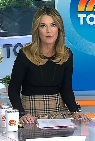 Savannah's black mesh inset top and beige plaid pleated skirt on Today