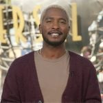 Scott’s maroon cardigan on Access Hollywood