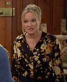 Sharon's black and yellow floral blouse on The Young and the Restless