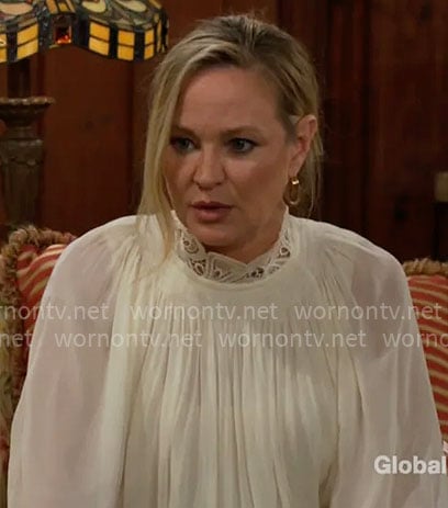 Sharon’s white lace-neck blouse on The Young and the Restless