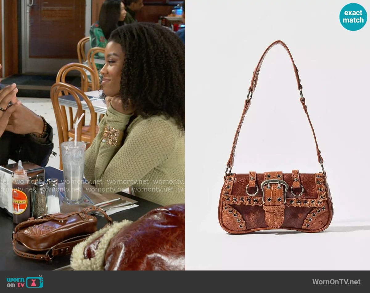Silence + Noise at Urban Outfitters Jade Laced Rivet Bag worn by Eva Thomas (Ambyr Michelle) on Beyond the Gates