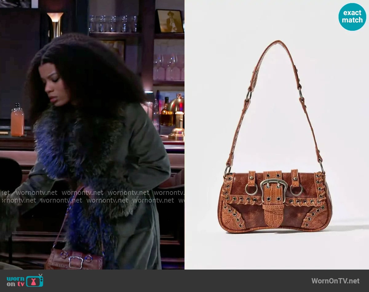 Silence + Noise at Urban Outfitters Jade Laced Rivet Bag worn by Eva Thomas (Ambyr Michelle) on Beyond the Gates