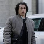 Simon’s beige knit bomber jacket on Abbott Elementary