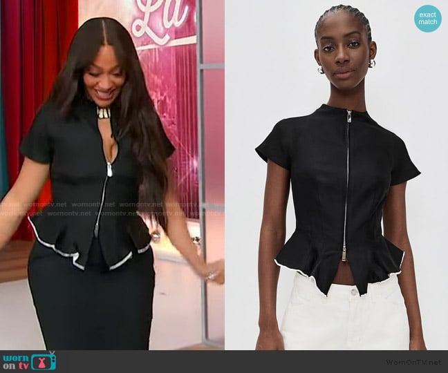 La La Anthony’s black piping trim top on Sherri