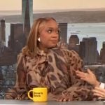 Sunny Anderson’s leopard print tie neck blouse on The Drew Barrymore Show