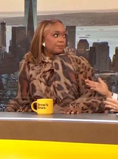 Sunny Anderson's leopard print tie neck blouse on The Drew Barrymore Show