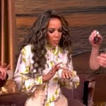 Sunny’s tie neck floral print blouse on The View