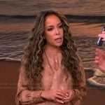 Sunny’s beige satin tie neck blouse on The View