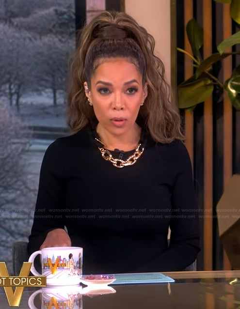 Sunny’s black chain neckline detail dress on The View