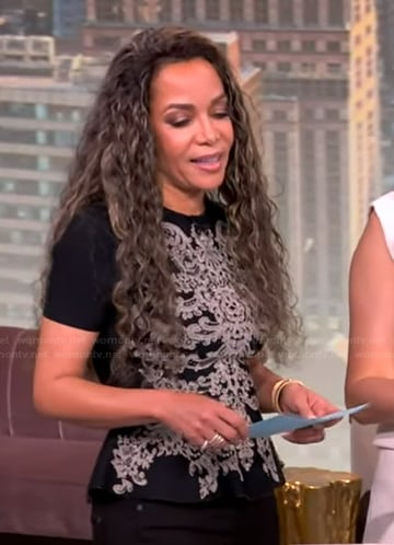 Sunny’s black lace peplum top on The View