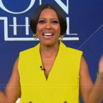 Tamron’s yellow double breasted vest on Tamron Hall Show