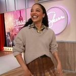 Tessa Thompson’s layered skirt and sweater on Sherri